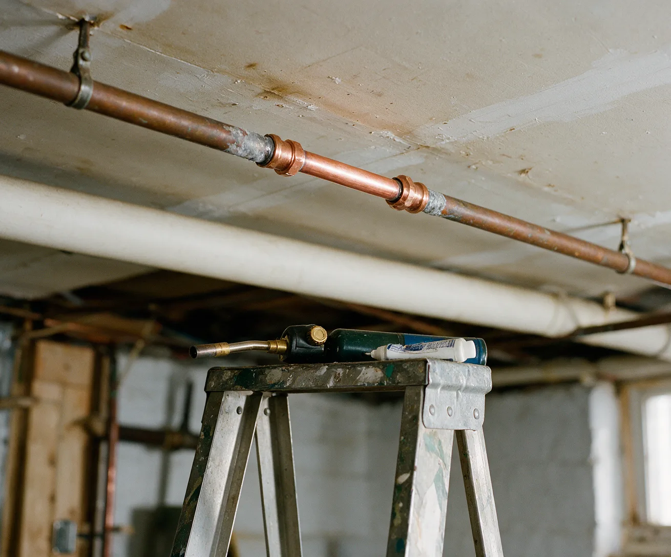 A new copper section soldered into an old water line